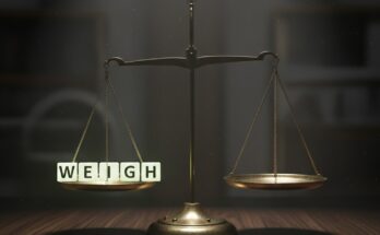 Illustration of the Wordle grid for February 3, 2026, revealing the answer WEIGH with a balance scale graphic.